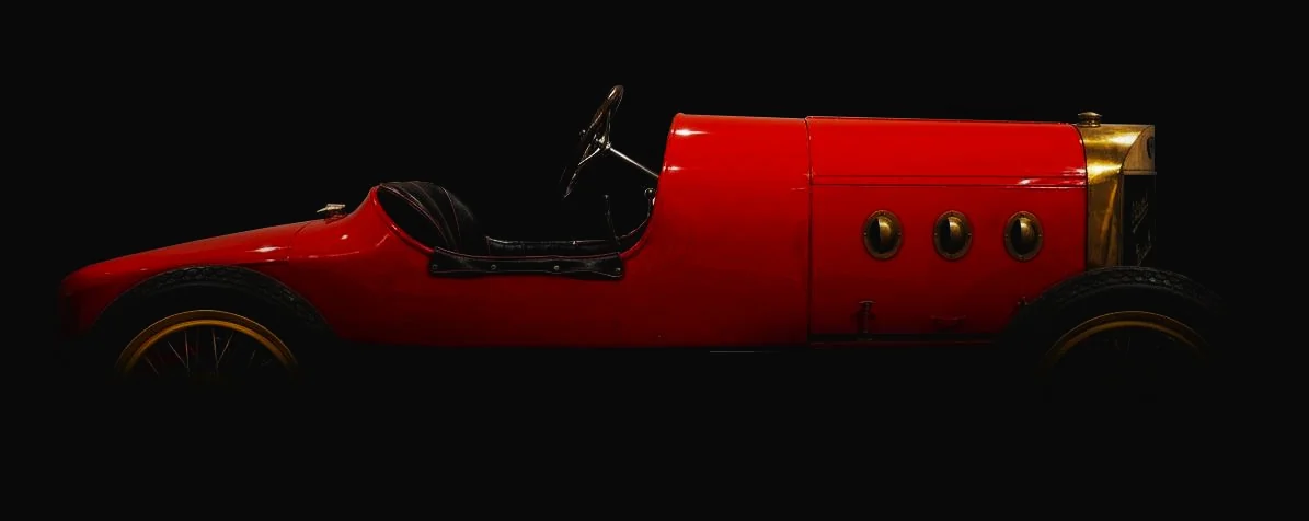 Red 1916 Abadal-Buick racing car, side view, reached 140 km/h