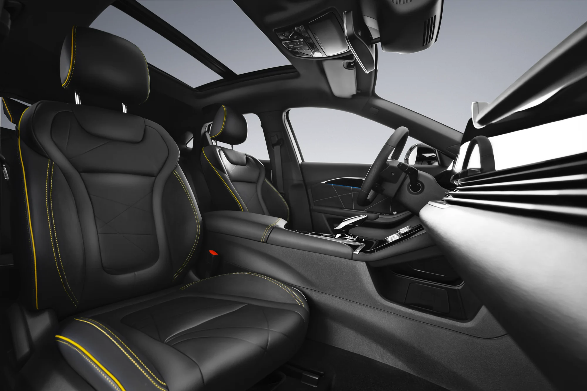 Sporty front seats in black leather with golden stitching